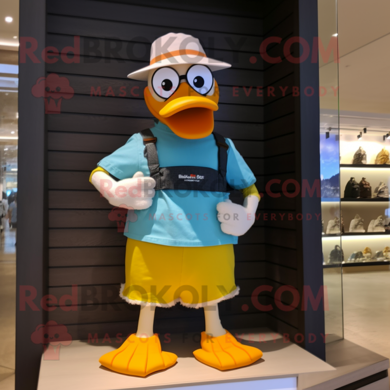 nan Duck mascot costume character dressed with a Board Shorts and Bracelet watches nan Duck mascot costume character dressed with a Board Shorts and Bracelet watches