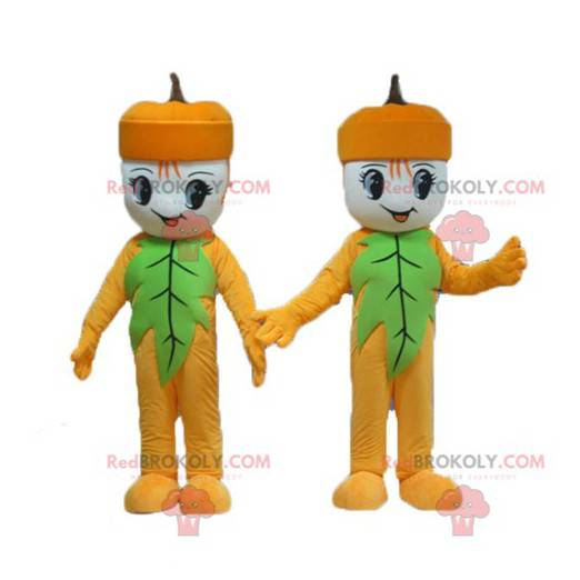 2 mascotes de bolotas de boneco de neve amarelas e verdes -