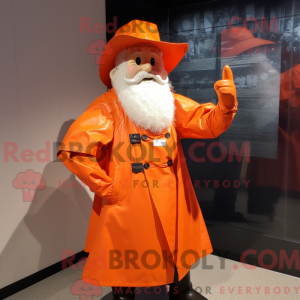 Maskotfigur af en orange...