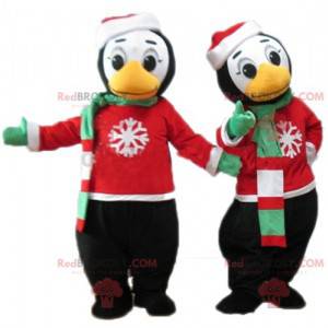 2 mascotes pinguins em traje de inverno - Redbrokoly.com