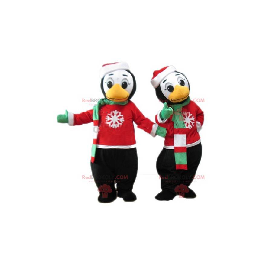 2 mascotes pinguins em traje de inverno - Redbrokoly.com