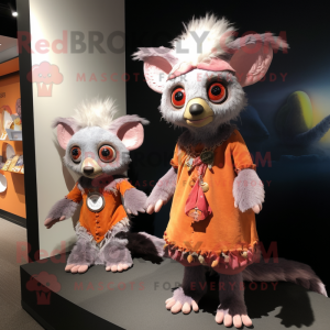 Peach Aye-Aye mascot costume character dressed with a Mini Dress and Beanies