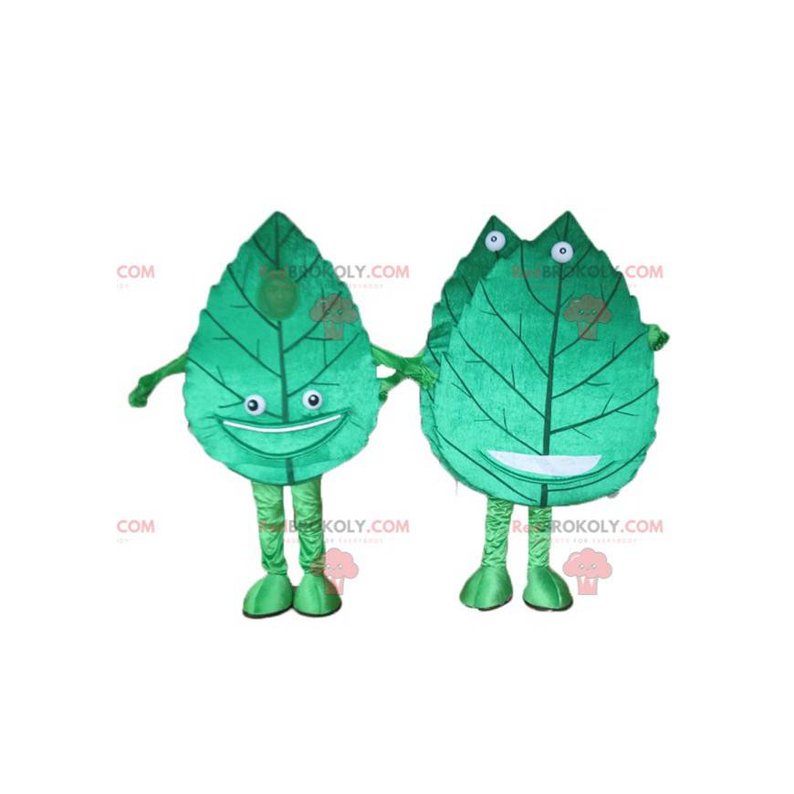 2 mascotes de folhas verdes gigantes e sorridentes -