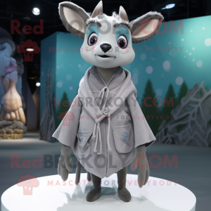 Gray Deer mascot costume character dressed with a Romper and Shawl pins