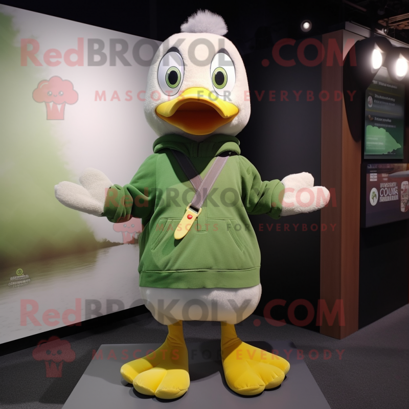 Olive Goose mascot costume character dressed with a Sweater and Keychains Olive Goose mascot costume character dressed with a Sweater and Keychains