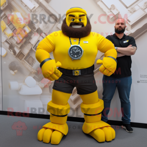 Yellow Strongman mascot costume character dressed with a T-Shirt and Smartwatches