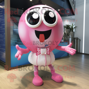 Pink Handball Ball mascot costume character dressed with a Swimwear and Bow ties