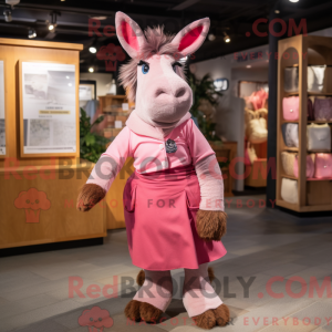 Maskotkarakter av et rosa...