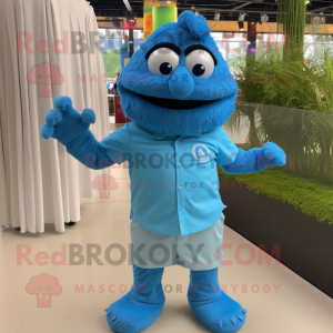 Blue Raspberry mascot costume character dressed with a Polo Shirt and Cufflinks
