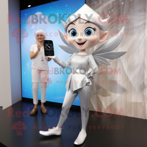 Silver Tooth Fairy mascot costume character dressed with a Dress Pants and Smartwatches