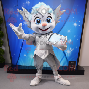 Silver Tooth Fairy mascot costume character dressed with a Dress Pants and Smartwatches