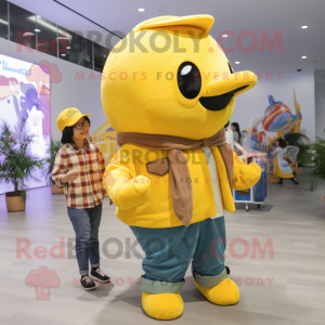 Yellow Whale mascot costume character dressed with a Flannel Shirt and Watches