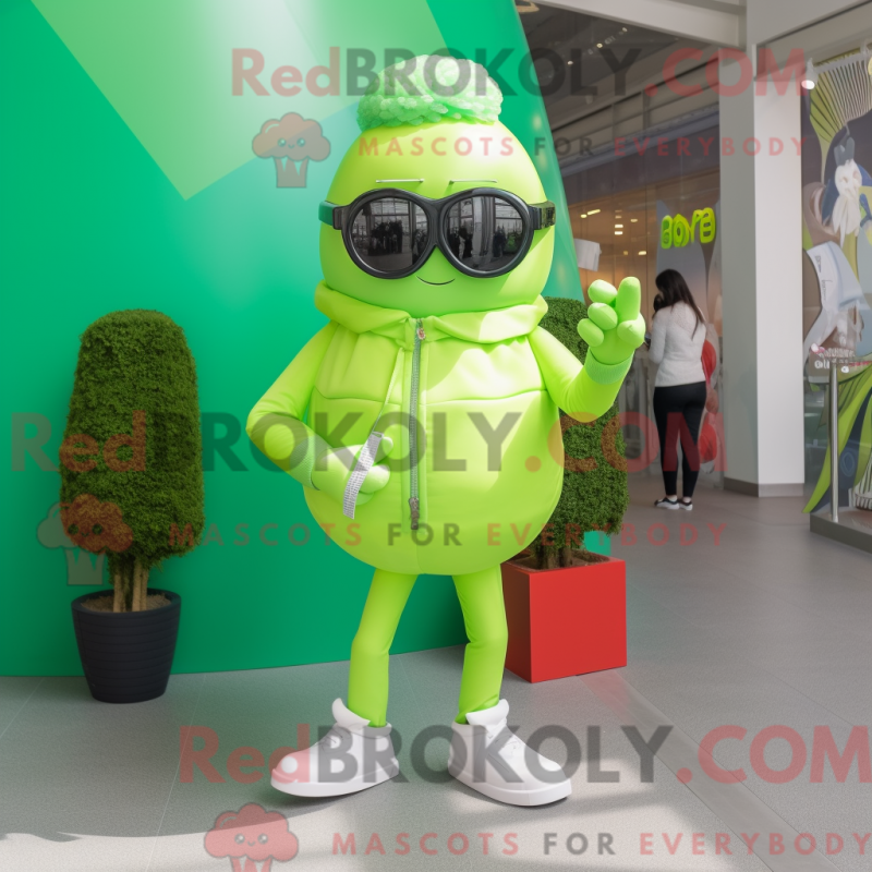 Mascot character of a Lime Green Candy dressed with a Playsuit and Sunglasses Mascot character of a Lime Green Candy dressed with a Playsuit and Sunglasses