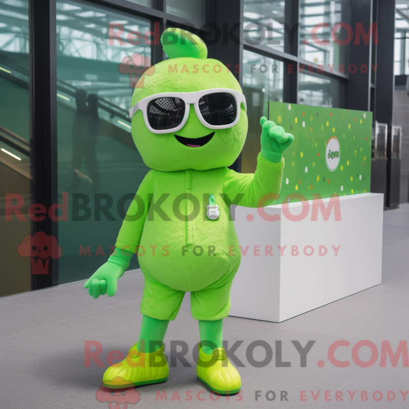 Mascot character of a Lime Green Candy dressed with a Playsuit and Sunglasses Mascot character of a Lime Green Candy dressed with a Playsuit and Sunglasses