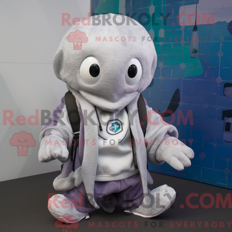 Mascot character of a Silver Octopus dressed with a Jacket and Beanies Mascot character of a Silver Octopus dressed with a Jacket and Beanies