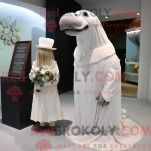 Mascot character of a Walrus dressed with a Wedding Dress and Caps