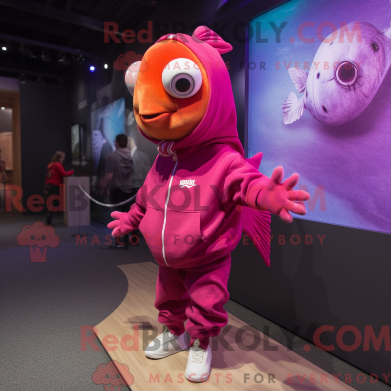 Mascot character of a Magenta Goldfish dressed with a Hoodie and Watches