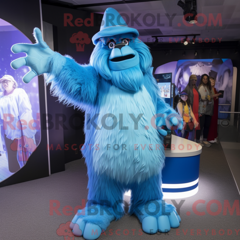 Mascot character of a Blue Sasquatch dressed with a A-Line Dress and Caps Mascot character of a Blue Sasquatch dressed with a A-Line Dress and Caps