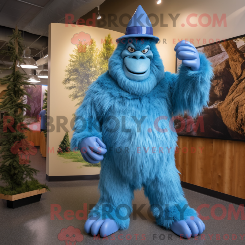 Mascot character of a Blue Sasquatch dressed with a A-Line Dress and Caps Mascot character of a Blue Sasquatch dressed with a A-Line Dress and Caps
