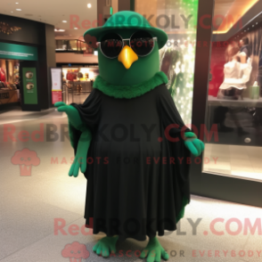 Mascot character of a Green Blackbird dressed with a Empire Waist Dress and Sunglasses