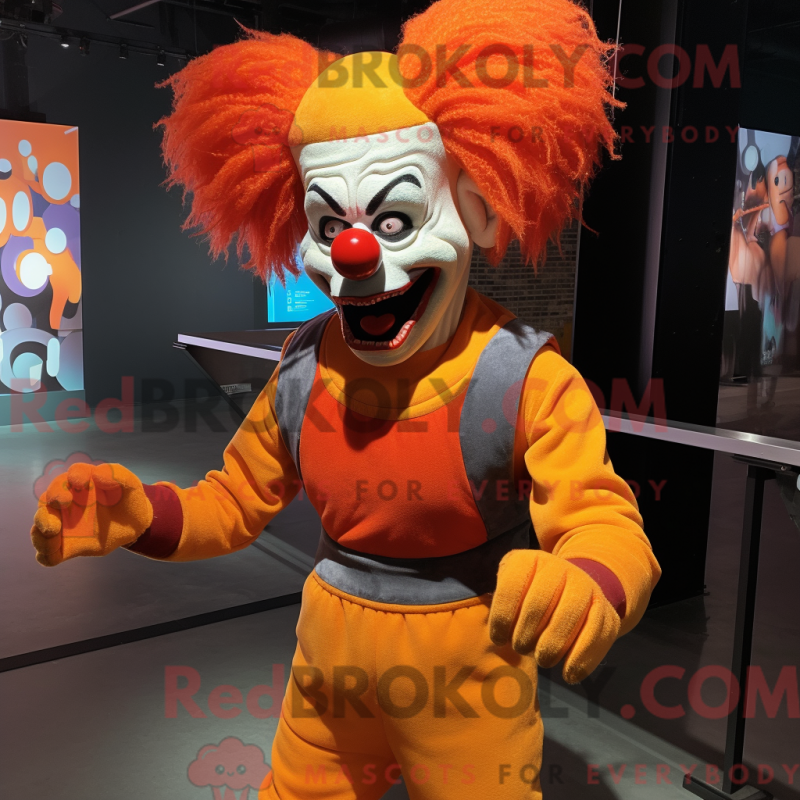 Mascot character of a Orange Evil Clown dressed with a Jeggings and Suspenders Mascot character of a Orange Evil Clown dressed with a Jeggings and Suspenders