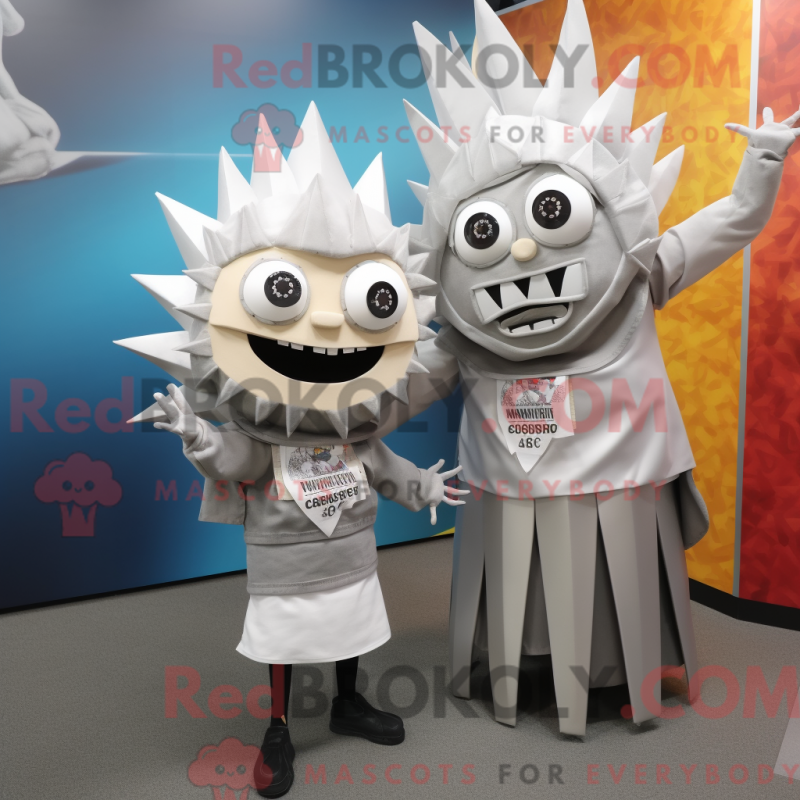 Mascot character of a Silver Tacos dressed with a Pencil Skirt and Keychains Mascot character of a Silver Tacos dressed with a Pencil Skirt and Keychains