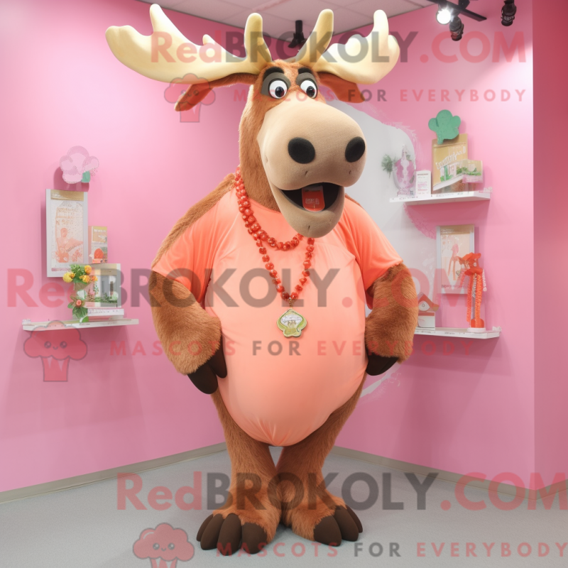 Mascot character of a Peach Moose dressed with a Long Sleeve Tee and Necklaces Mascot character of a Peach Moose dressed with a Long Sleeve Tee and Necklaces