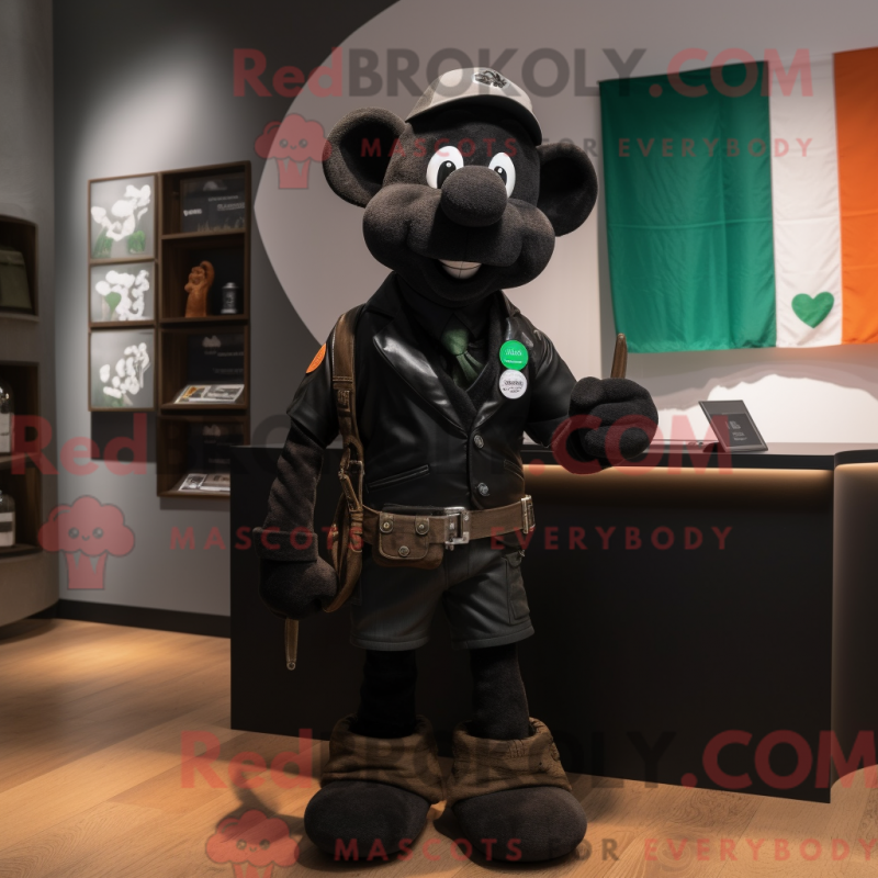 Mascot character of a Black Irish Flag dressed with a Leather Jacket and Briefcases Mascot character of a Black Irish Flag dressed with a Leather Jacket and Briefcases