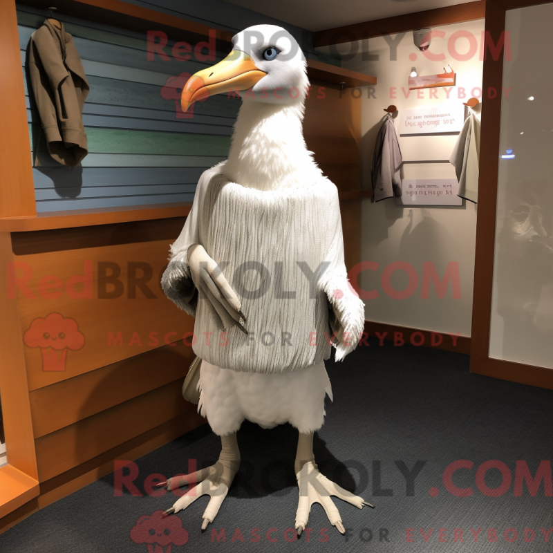 Mascot character of a Albatross dressed with a Sweater and Shoe clips Mascot character of a Albatross dressed with a Sweater and Shoe clips