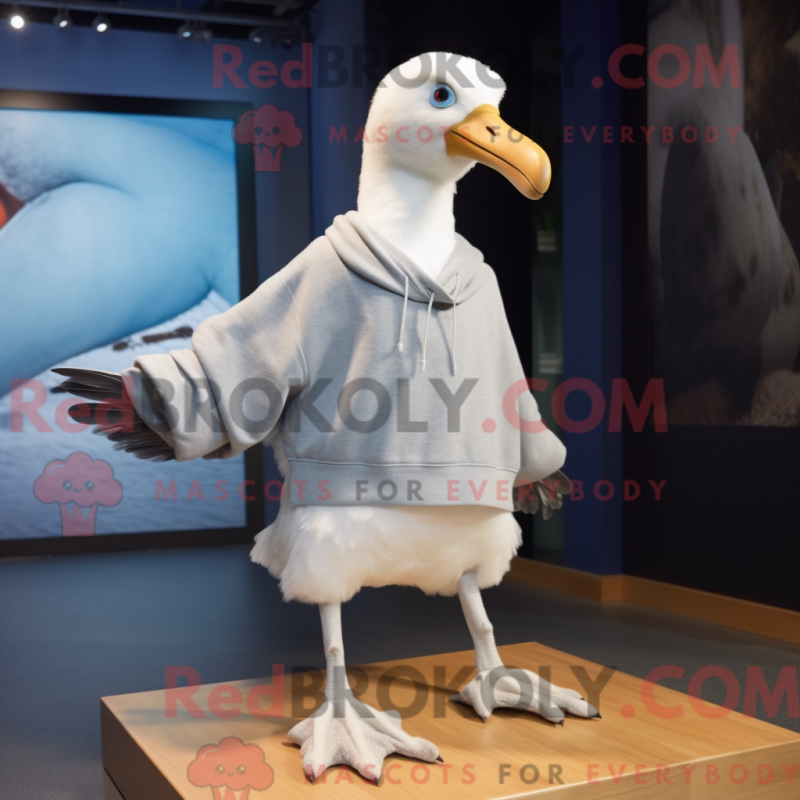 Mascot character of a Albatross dressed with a Sweater and Shoe clips Mascot character of a Albatross dressed with a Sweater and Shoe clips