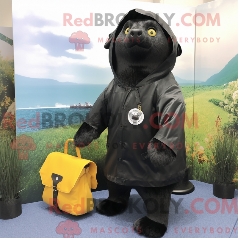Mascot character of a Black Seal dressed with a Raincoat and Messenger bags Mascot character of a Black Seal dressed with a Raincoat and Messenger bags