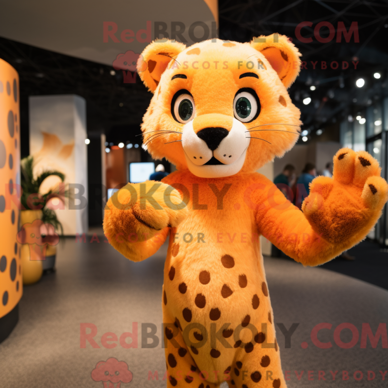 Mascot character of a Orange Cheetah dressed with a Sheath Dress and Mittens Mascot character of a Orange Cheetah dressed with a Sheath Dress and Mittens