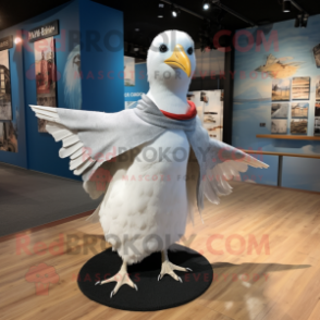 Silver Gull mascot costume character dressed with a V-Neck Tee and Shawl pins