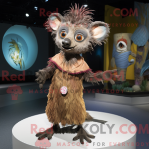 Mascot character of a Tan Aye-Aye dressed with a Dress and Rings