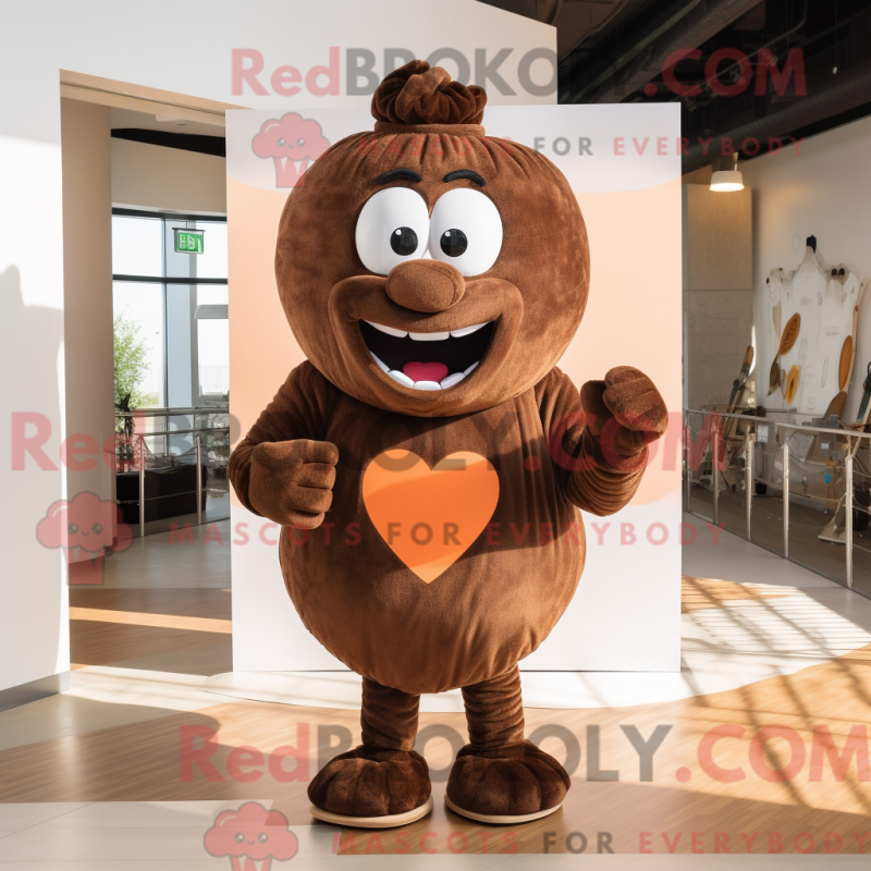 Mascot character of a Brown Heart dressed with a Shift Dress and Suspenders Mascot character of a Brown Heart dressed with a Shift Dress and Suspenders