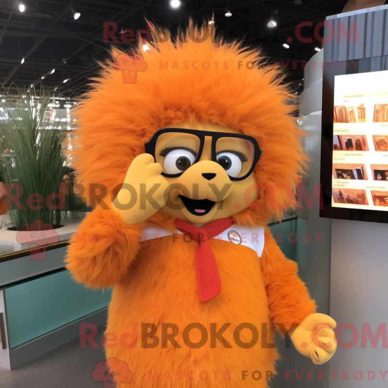 Mascot character of a Orange Porcupine dressed with a Blouse and Eyeglasses Mascot character of a Orange Porcupine dressed with a Blouse and Eyeglasses
