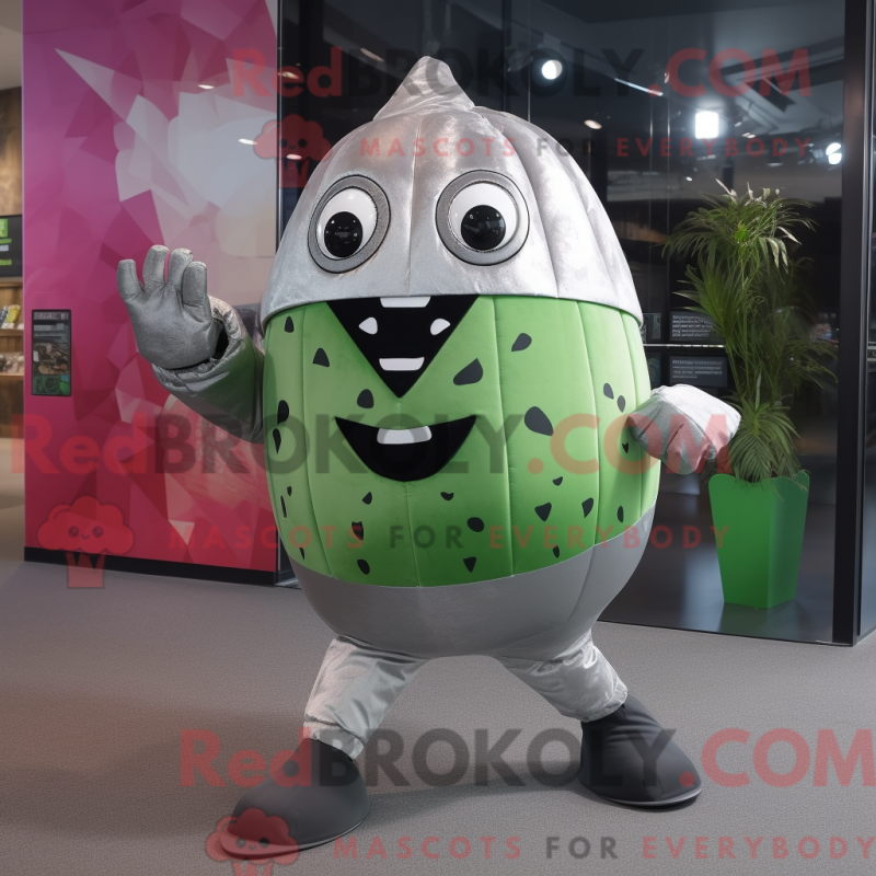 Mascot character of a Silver Watermelon dressed with a Bodysuit and Backpacks Mascot character of a Silver Watermelon dressed with a Bodysuit and Backpacks