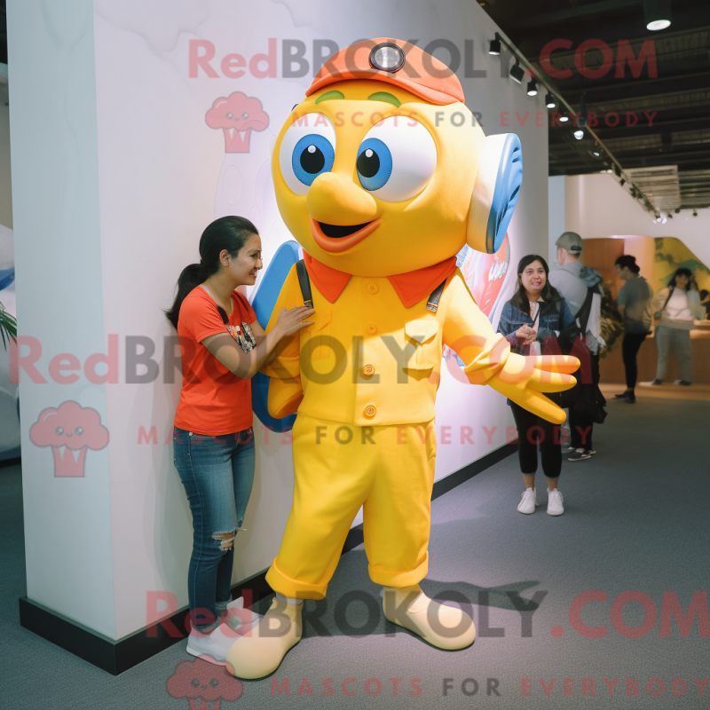 Mascot character of a Yellow Clown Fish dressed with a Mom Jeans and Bracelet watches Mascot character of a Yellow Clown Fish dressed with a Mom Jeans and Bracelet watches