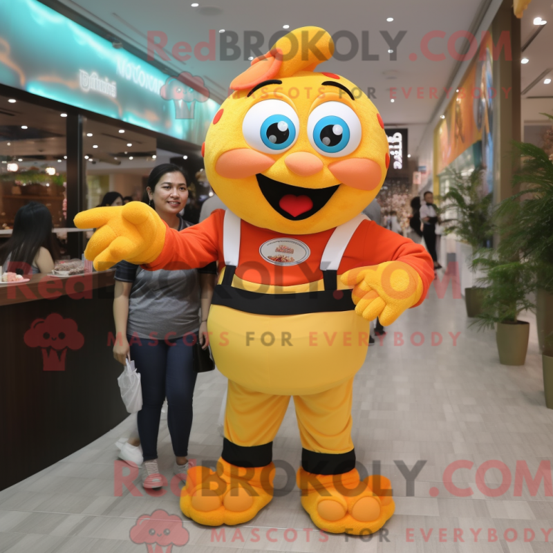 Mascot character of a Yellow Clown Fish dressed with a Mom Jeans and Bracelet watches Mascot character of a Yellow Clown Fish dressed with a Mom Jeans and Bracelet watches