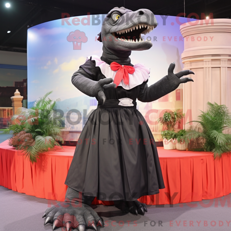 Mascot character of a Black Tyrannosaurus dressed with a Pleated Skirt and Shawls Mascot character of a Black Tyrannosaurus dressed with a Pleated Skirt and Shawls