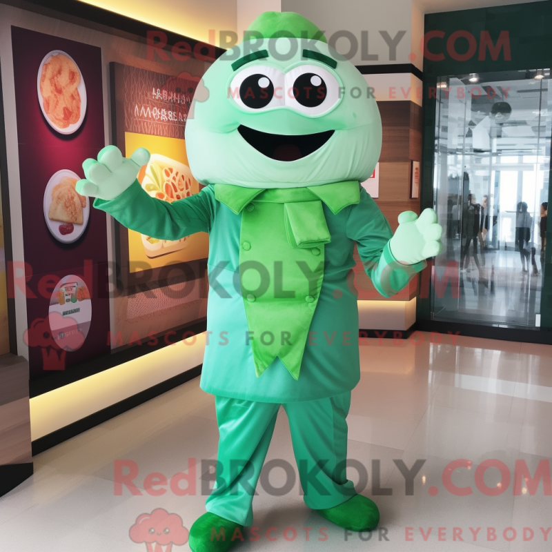 Mascot character of a Green Dim Sum dressed with a Playsuit and Cufflinks Mascot character of a Green Dim Sum dressed with a Playsuit and Cufflinks
