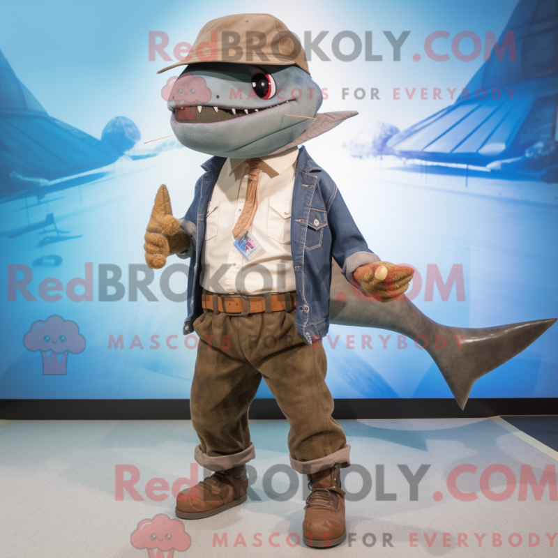 Mascot character of a Brown Swordfish dressed with a Boyfriend Jeans and Hat pins Mascot character of a Brown Swordfish dressed with a Boyfriend Jeans and Hat pins