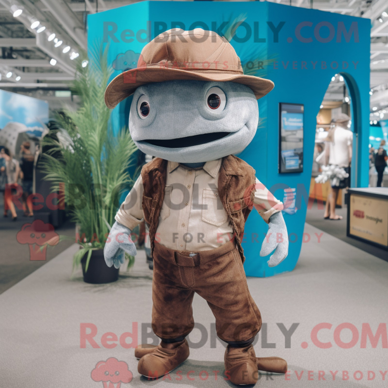 Mascot character of a Brown Swordfish dressed with a Boyfriend Jeans and Hat pins Mascot character of a Brown Swordfish dressed with a Boyfriend Jeans and Hat pins