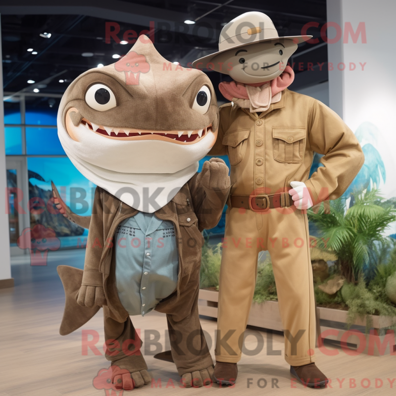 Mascot character of a Brown Swordfish dressed with a Boyfriend Jeans and Hat pins Mascot character of a Brown Swordfish dressed with a Boyfriend Jeans and Hat pins