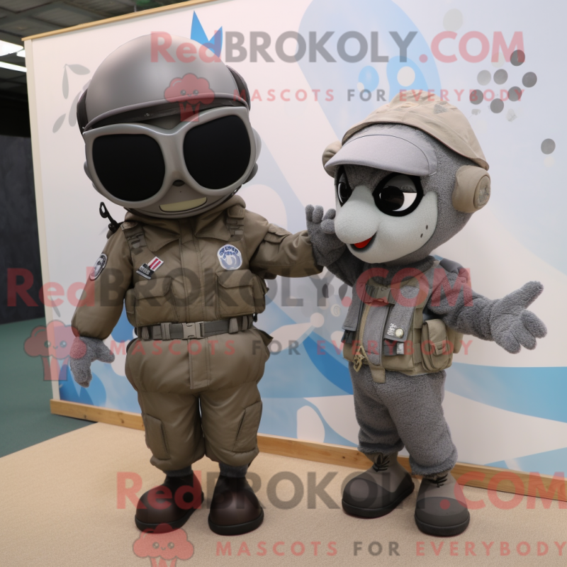 Mascot character of a Gray Special Air Service dressed with a Sweater and Ties Mascot character of a Gray Special Air Service dressed with a Sweater and Ties