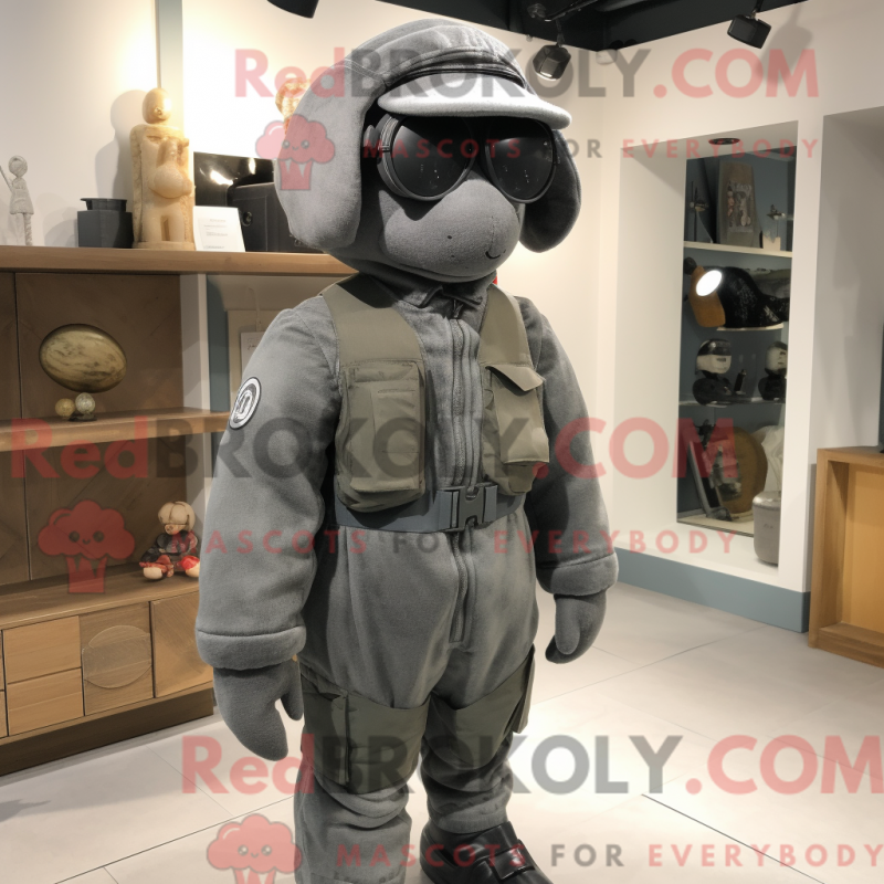 Mascot character of a Gray Special Air Service dressed with a Sweater and Ties Mascot character of a Gray Special Air Service dressed with a Sweater and Ties