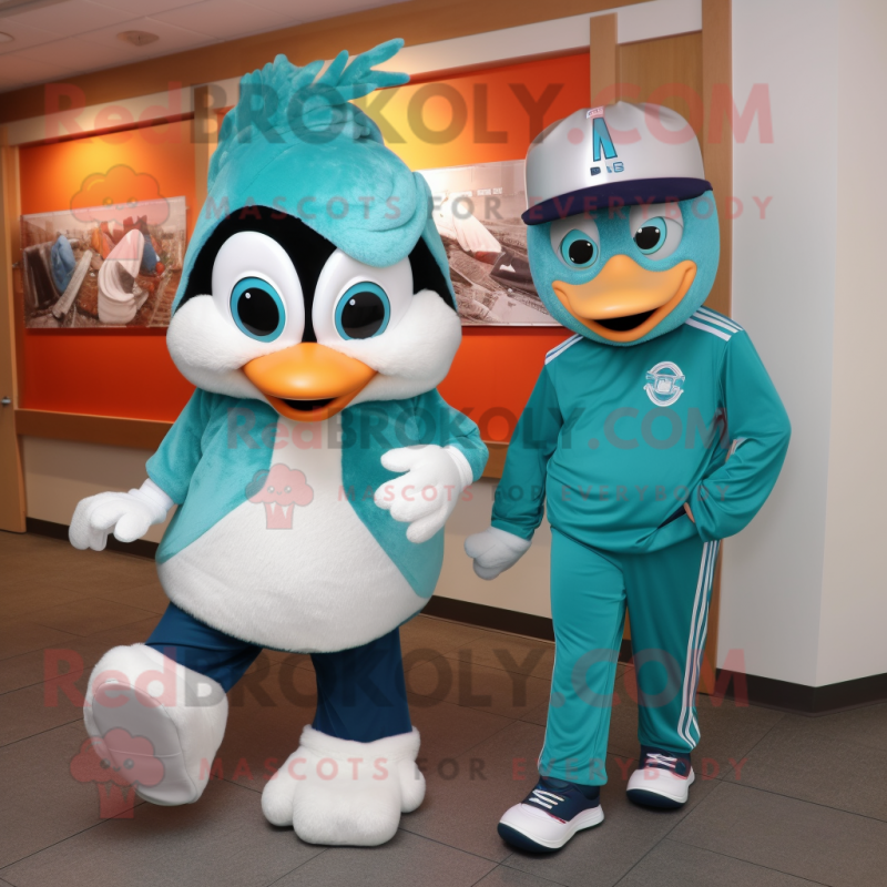 Teal Ice mascot costume character dressed with a Capri Pants and Watches Teal Ice mascot costume character dressed with a Capri Pants and Watches