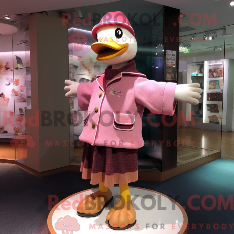 Mascot character of a Pink Geese dressed with a Sweater and Berets Mascot character of a Pink Geese dressed with a Sweater and Berets