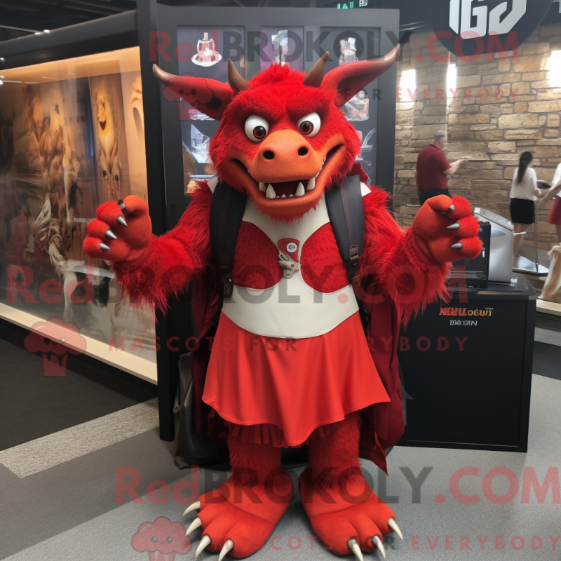 Mascot character of a Red Gargoyle dressed with a Empire Waist Dress and Backpacks Mascot character of a Red Gargoyle dressed with a Empire Waist Dress and Backpacks