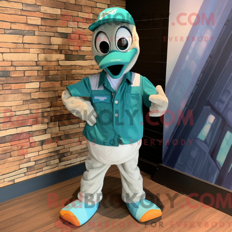 Mascot character of a Teal Gosling dressed with a Bermuda Shorts and Ties Mascot character of a Teal Gosling dressed with a Bermuda Shorts and Ties
